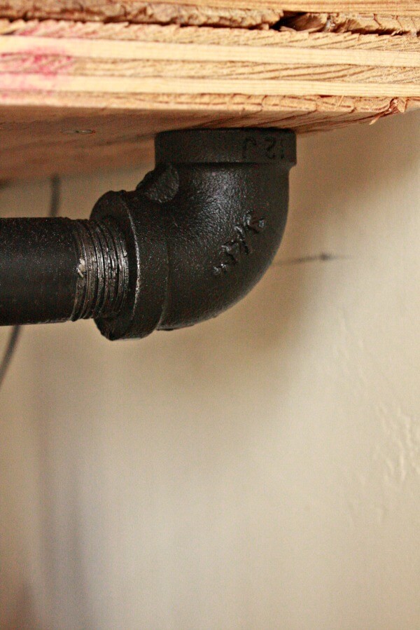 DIY industrial pipe shelves. Use your imagination to come up with any configuration. There are so many options to what you can do. | Twelveonmain.com 