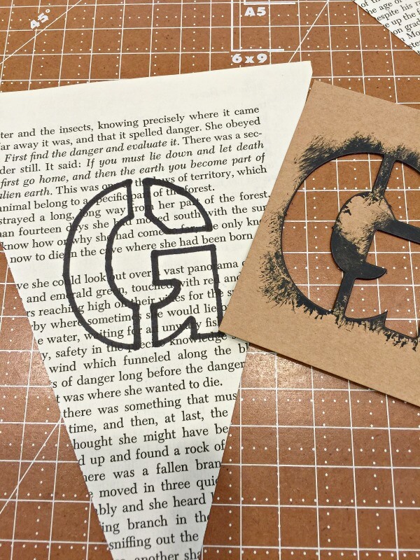 Make this spring banner with book pages! Such a great idea! | Twelveonmain.com