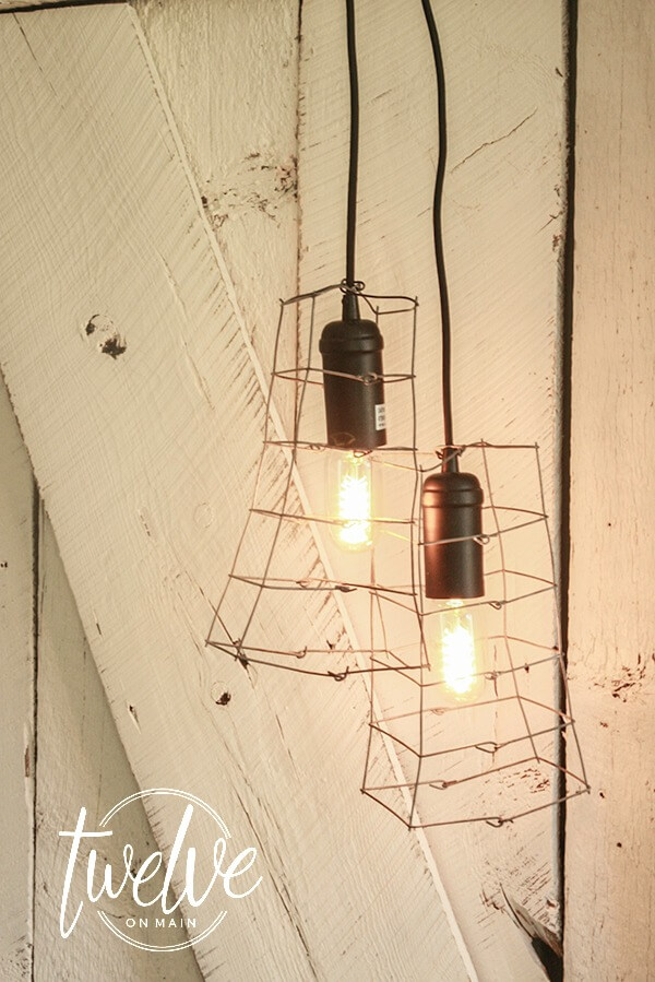 What happens when you marry farmhouse style with industrial style goodness? This DIY Industrial Farmhouse Light fixture is so great! | Twelveonmain.com