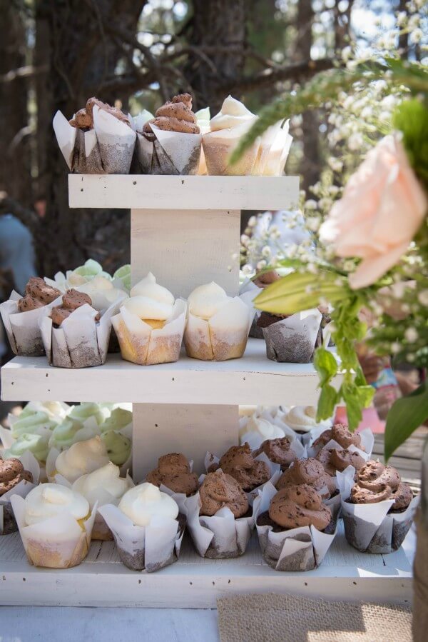 These neutral tones cupcakes were served at an outdoor woodland wedding. Love that handmade cupcake stand and the parchment cupcake wrappers.
