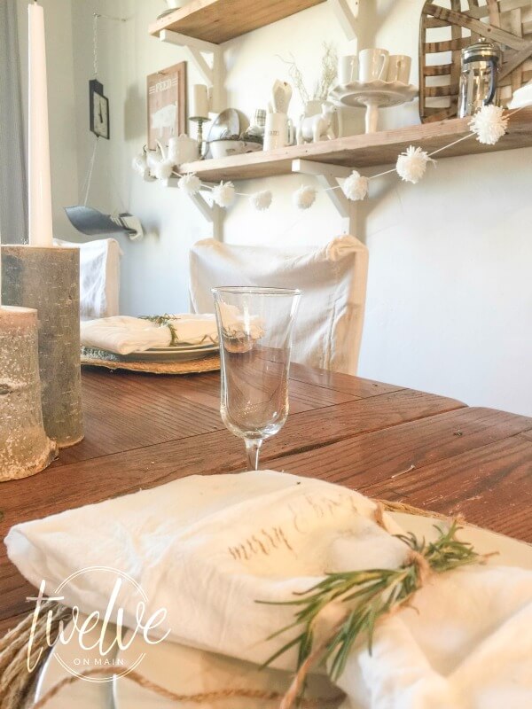 I love this farmhouse Christmas tablescape. Every detail is perfect! Check out the copper mugs!