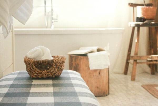 This farmhouse master bathroom makeover is incredible! Shiplap, subway tile, and raw rustic wood!!! Must see! farmhouse-master-bathroom