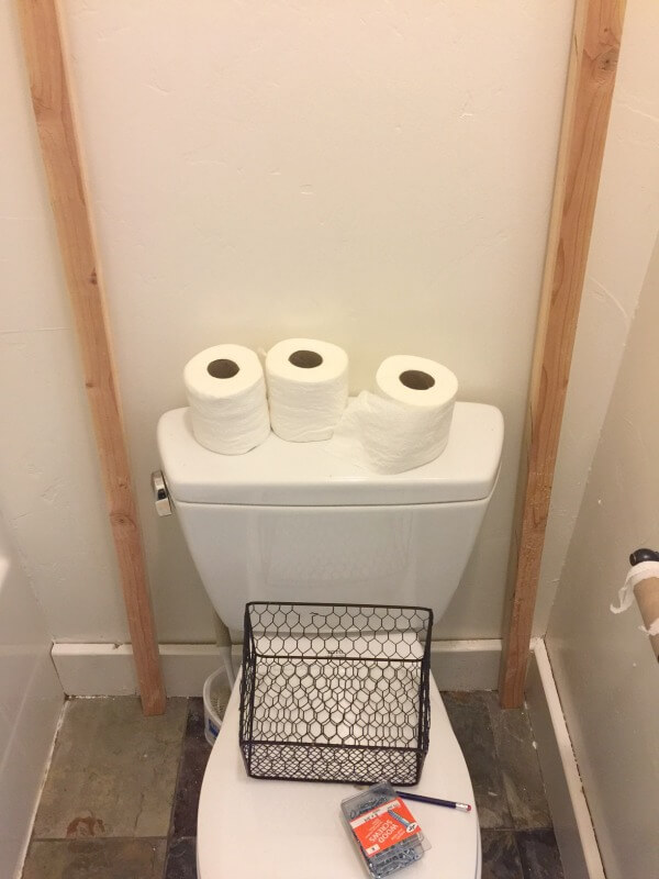Make this DIY over the toilet towel storage ladder!