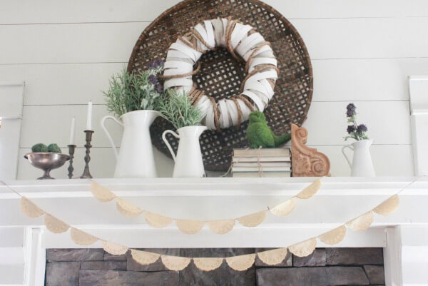 Its time to clean out the winter and decorate! Check out this farmhouse spring mantel! It is sure to inspire you to decorate your home for spring!