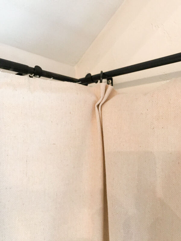 Make easy, no sew dropcloth curtains and install them easily with these tips!