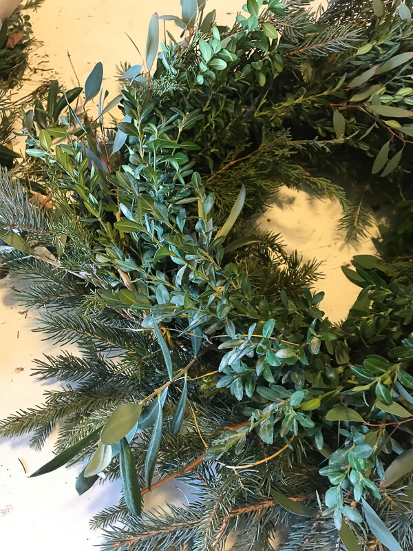 How to secure greenery on a fresh Christmas wreath
