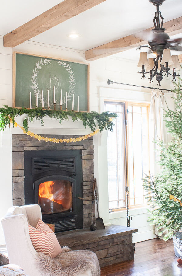 Are you a fan of the popular Scandinavian Christmas decor? Well, come check out my Scandinavian inspired Christmas mantel and tips to do it yourself!