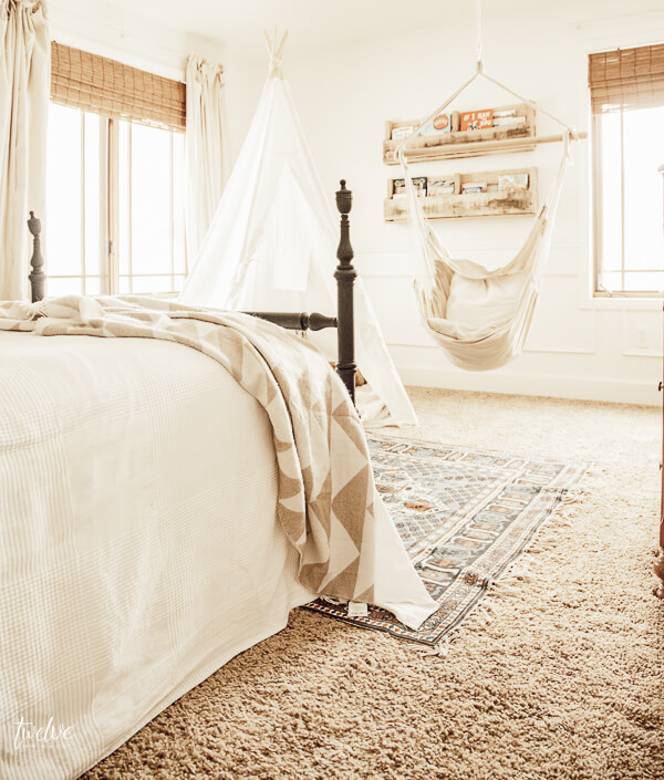 I cannot get enough of this little girls room! Love the cozy boho style reading nook!