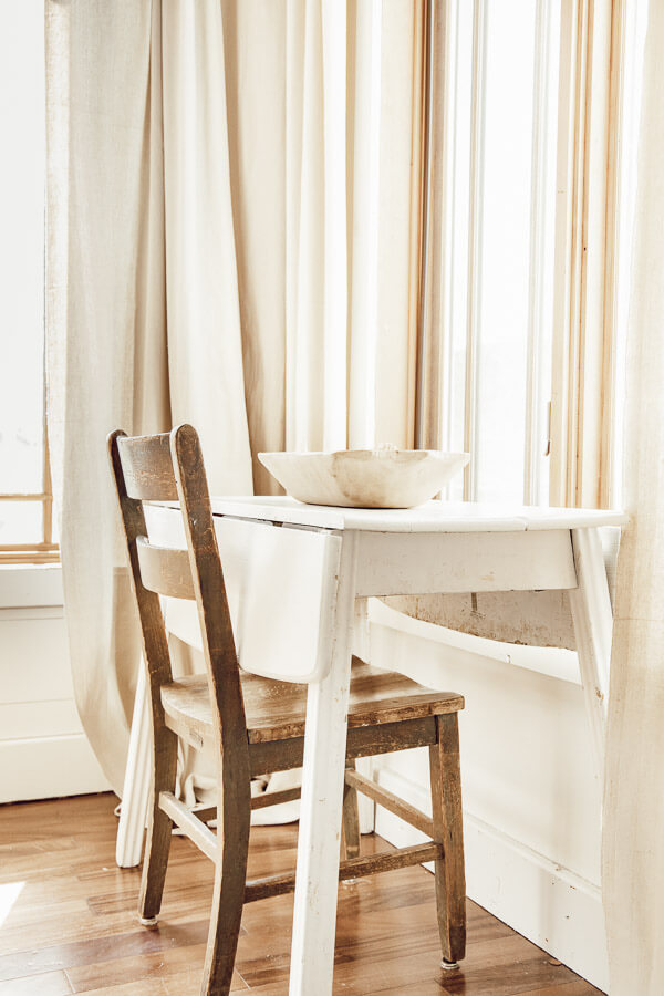 Antique chair and drop leaf table in the living room
