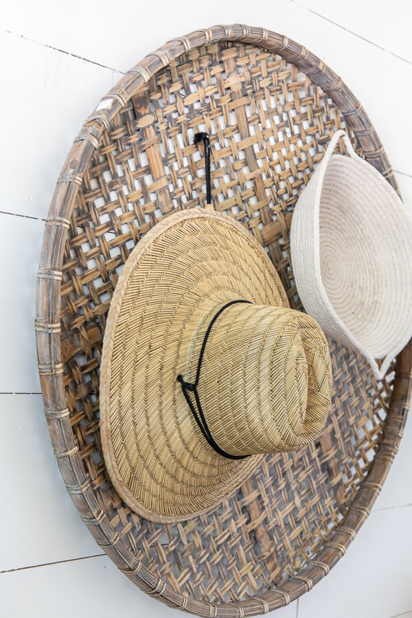 Large baskets hung on the wall as wall decor in the entryway