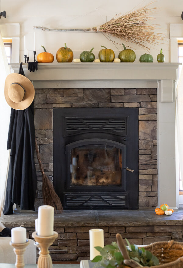 A very fun and stylish witch inspired Halloween mantel. Find a place to park your broom, hang your cloak and riding gloves and sit down and take a spell! 