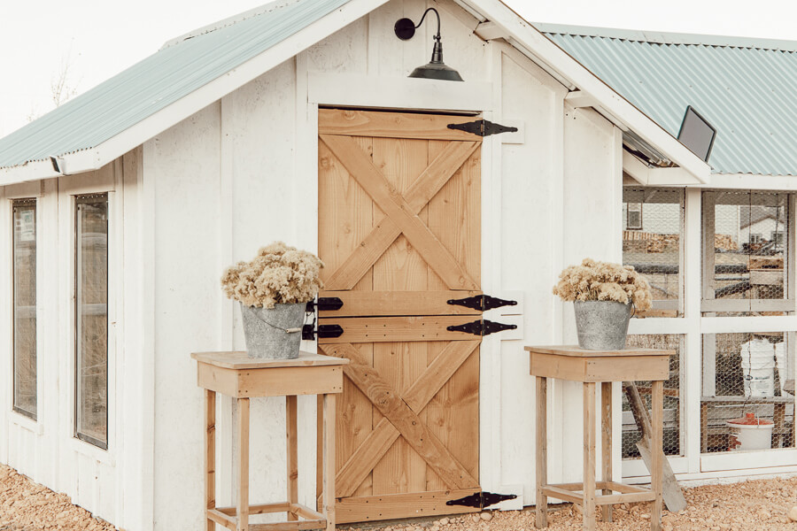 Gorgeous chicken coop ideas including dutch doors, stylish solar outdoor lights, and so much more!