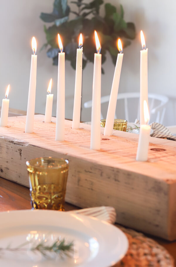 This DIY wood candle holder is so easy to make! The rustic candle holder makes such a statement and is the perfect focal point. Tutorial here.