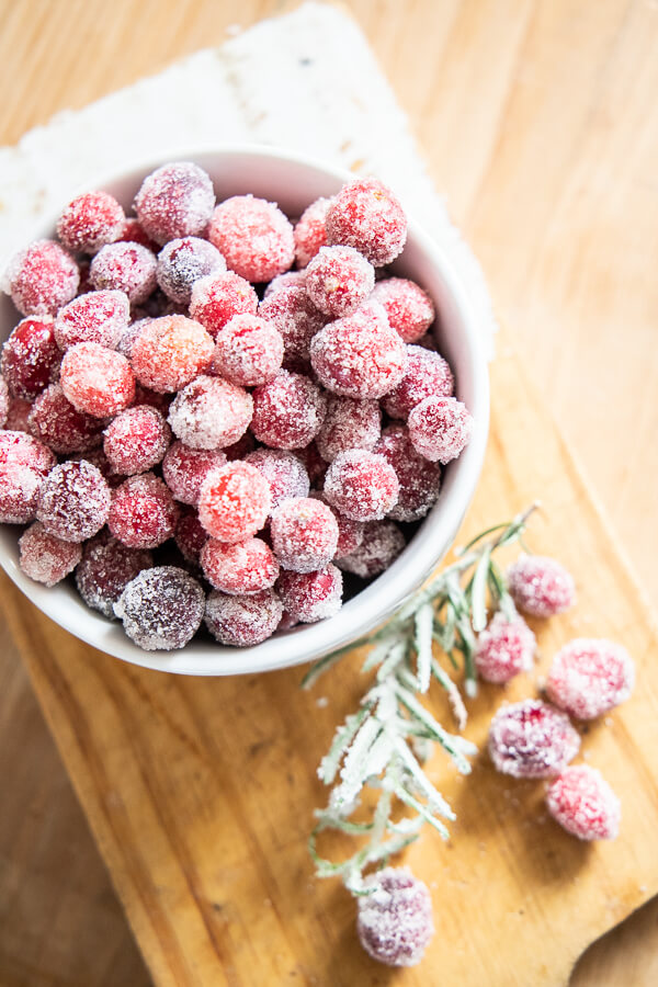 How to make sugared cranberries for all your festive holiday needs! Use your sugared cranberries for desserts, charcuterie boards, and so much more!