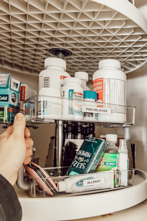 Organization tips for the perfectly arranged medicine cabinet! Ours is in a lazy susan cabinet and its so hard to keep it clean! Come see what we do to keep it organized!