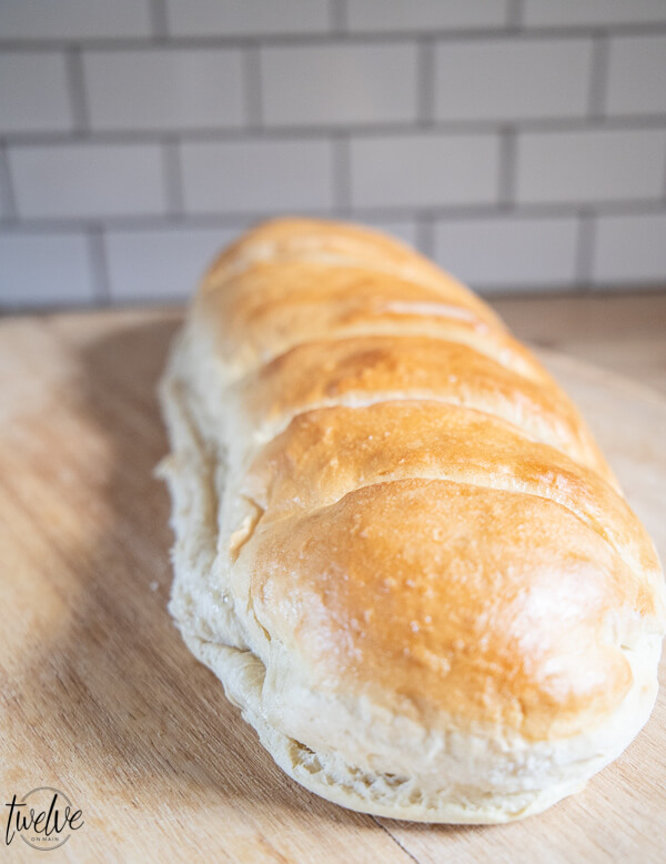 How to make the easiest french bread recipe ever! This is perfect for garlic bread, french toast and more! Did I mention how inexpensive it is to make? 