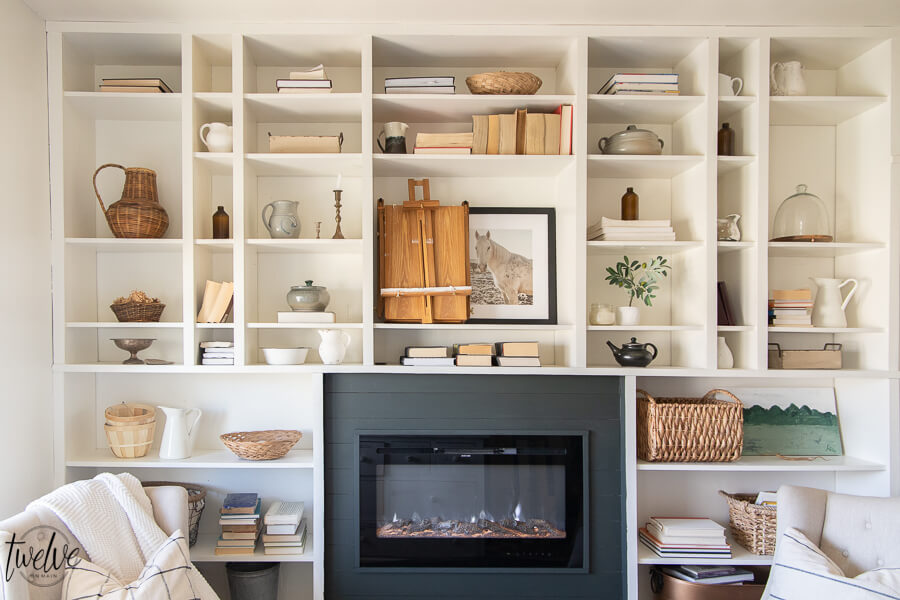How I used my Wagner paint sprayer to makeover my office bookshelves and how we added a built in electric fireplace to the space in only a couple hours on a Saturday!
