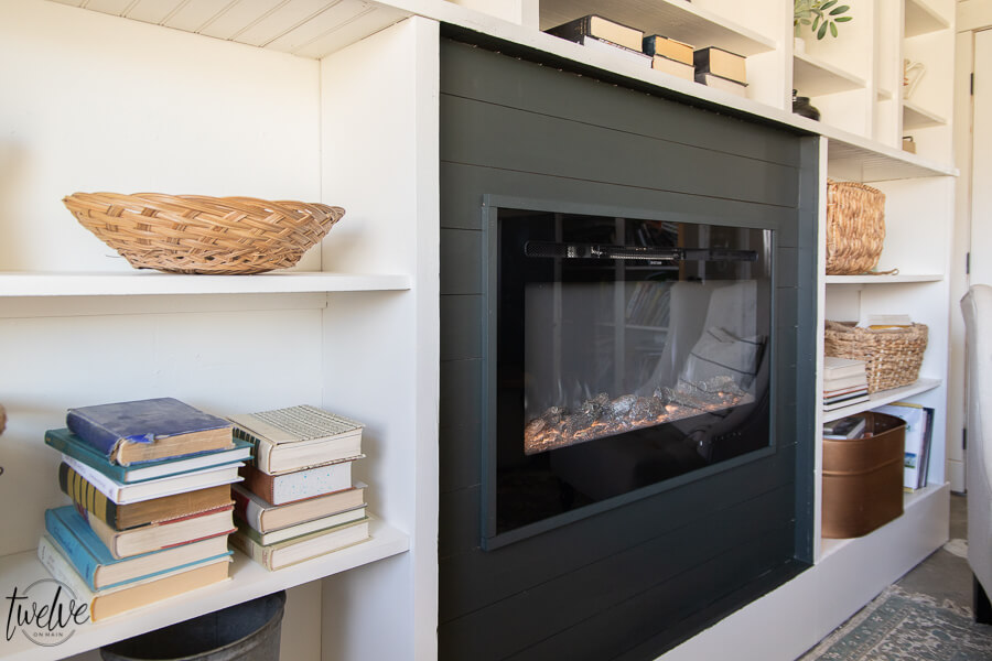 How I used my Wagner paint sprayer to makeover my office bookshelves and how we added a built in electric fireplace to the space in only a couple hours on a Saturday!