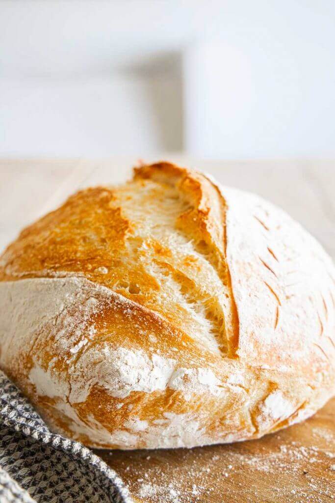 How to make an amazing dutch oven sourdough bread or sourdough boule!  This has step by step instructions that make it really easy to plan your time and you will realize how easy it is to make!