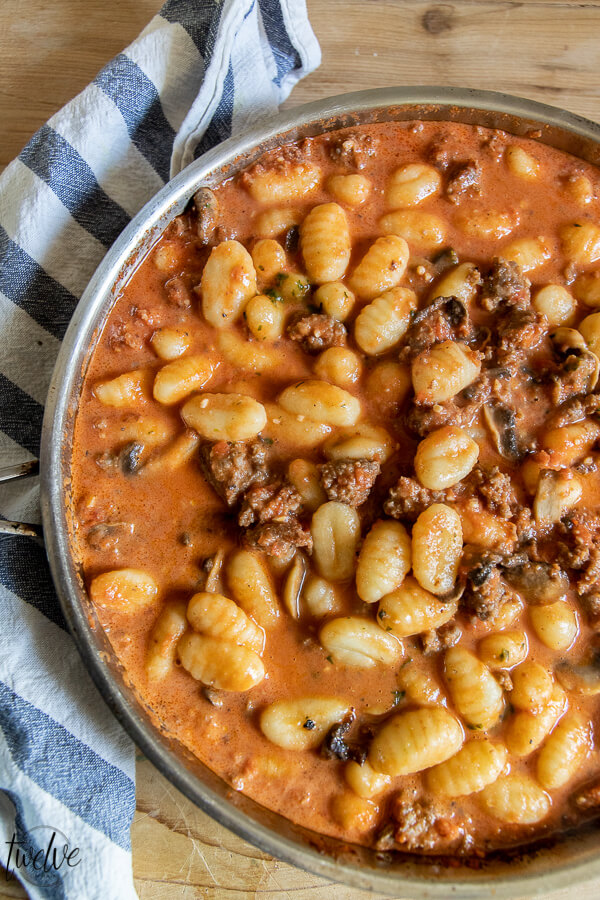 Make this creamy tomato and sausage gnocchi recipe in 30 minutes~ It is so easy to make! You can add spinach, mushrooms and more to make it your own.