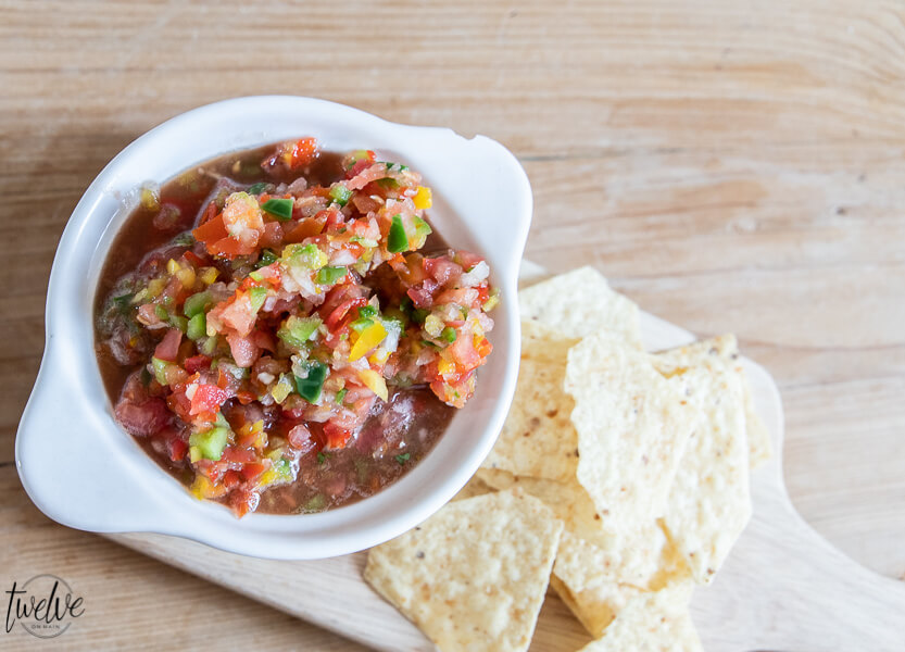 Get this zesty fresh salsa recipe now!  Makes the most amazing nachos, perfect on eggs and breakfast burritos, and killer on tacos.  Make it now!