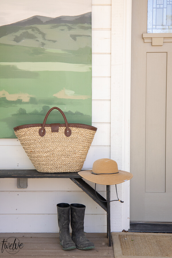 How to use artwork in your front porch decor! Get tons of front porch decor tips and ideas. Decorating does not have to be expensive or complicated!