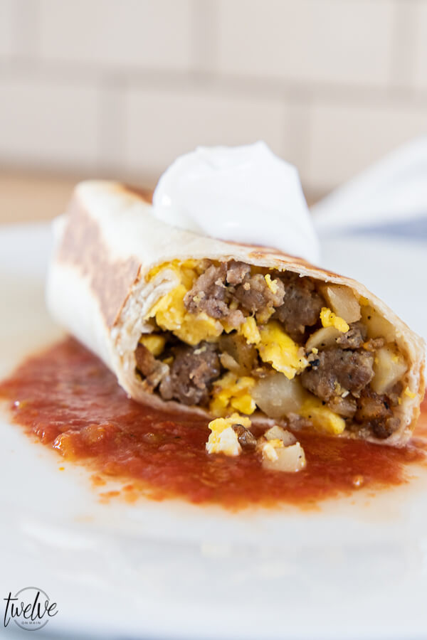 Super easy and super tasty egg, sausage, and potatoe breakfast burrito recipe. This is one of our favorites, makes enough for leftovers and is a hit!