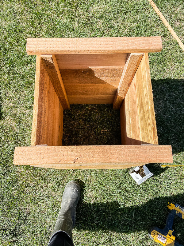 Adding trim to the cedar garden box