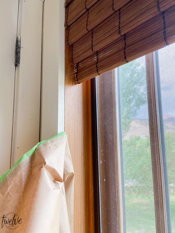 How to paint around windows using a paint sprayer.