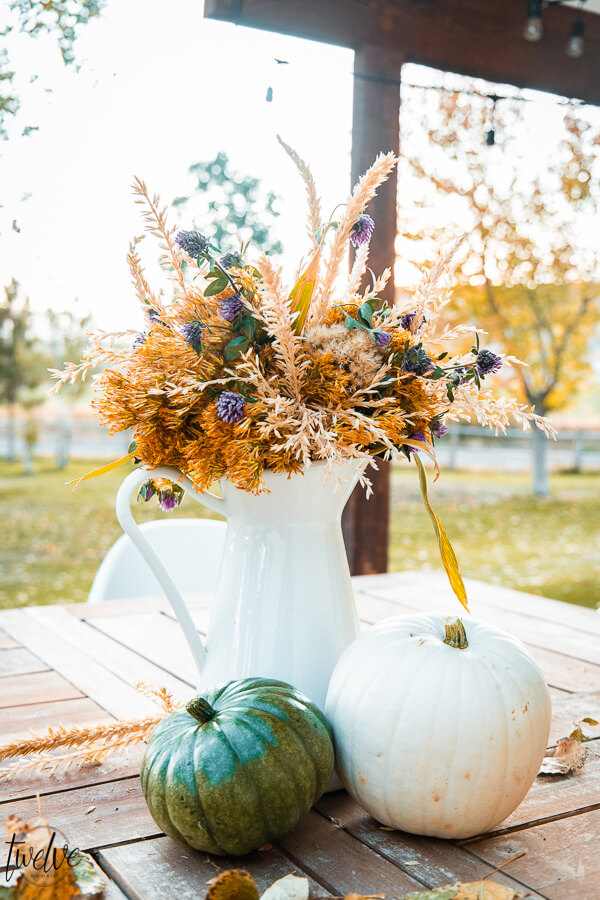 How to create a simple fall floral arrangement with items from your own backyard! Its amazing what you can create for free!
