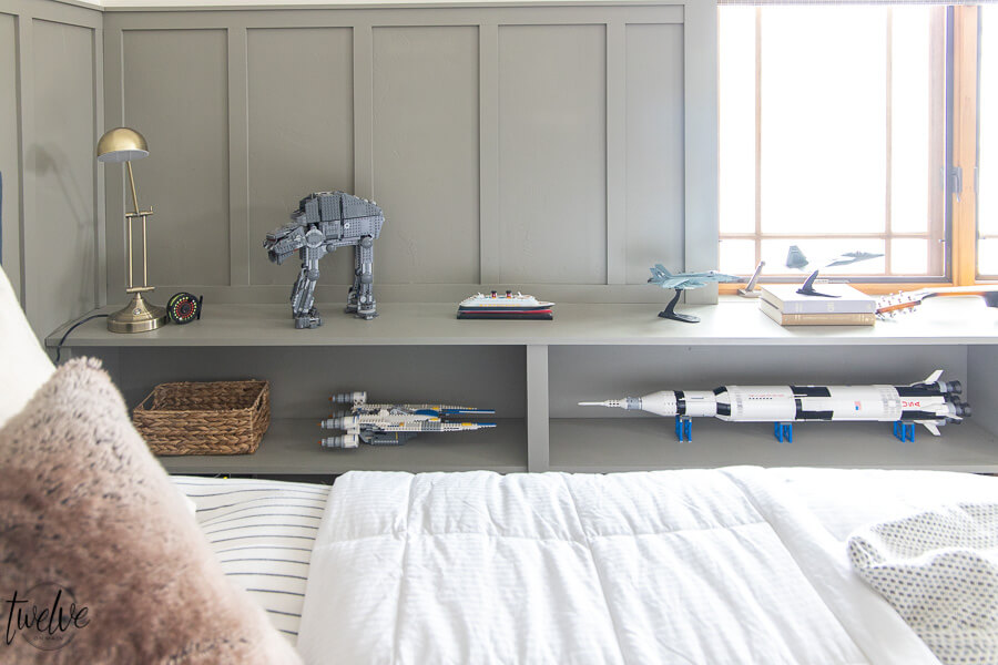 Built in bookshelves in our teen bedroom.  The perfect place to display his favorite things.
