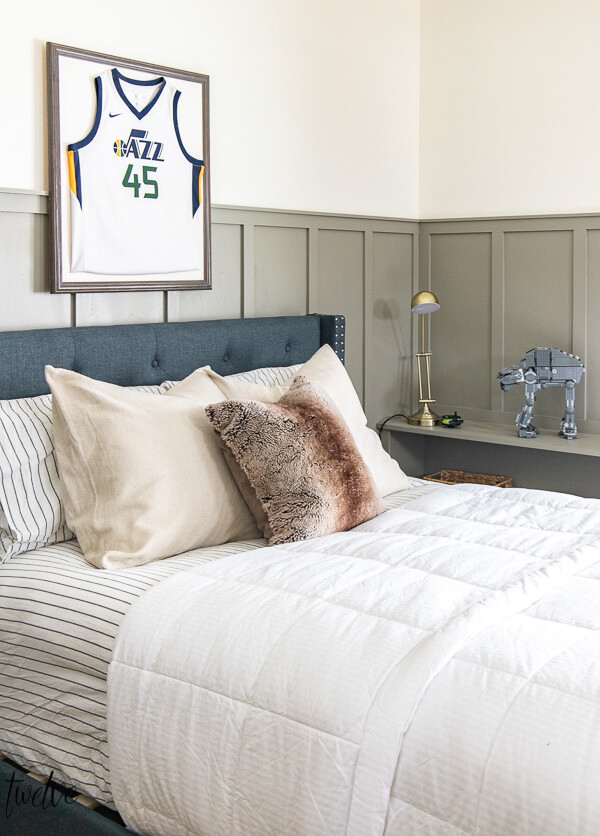 Gettysburg Grey paint on the board and batten walls, a basketball jersey wall art, new bedding and special touches for this new teen bedroom.