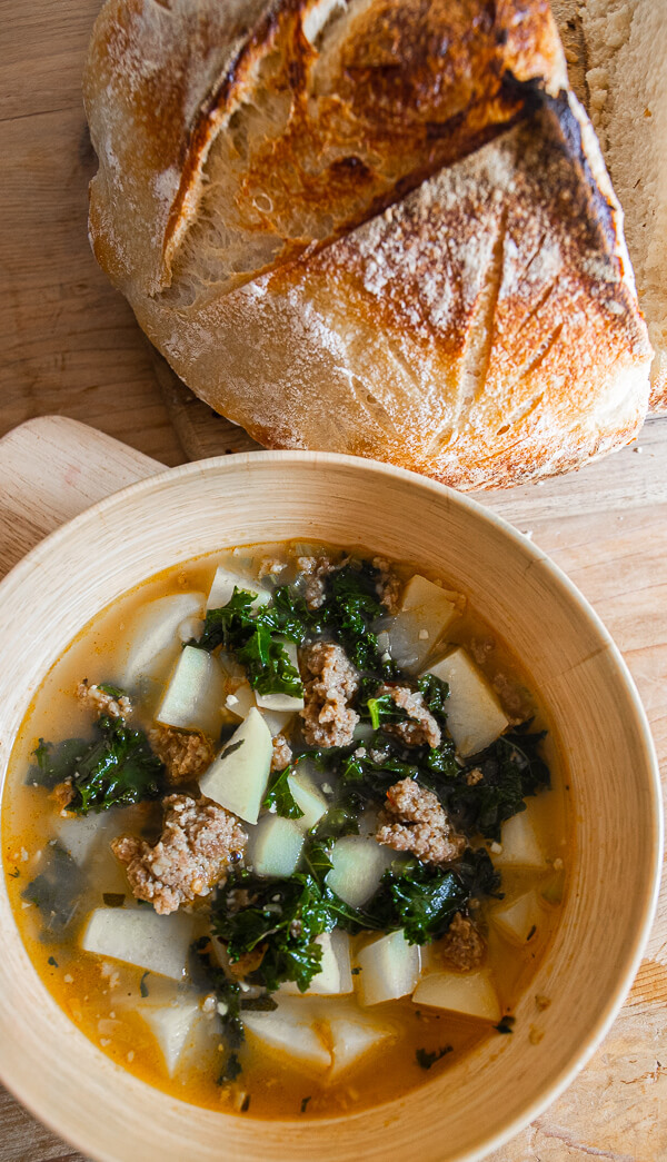 This sausage, kale and potato sup is made even better using spicy sausage! Try this spicy sausage and potato soup today! The flavor is out of this world! It is perfect for a rainy day or a busy weeknight dinner!