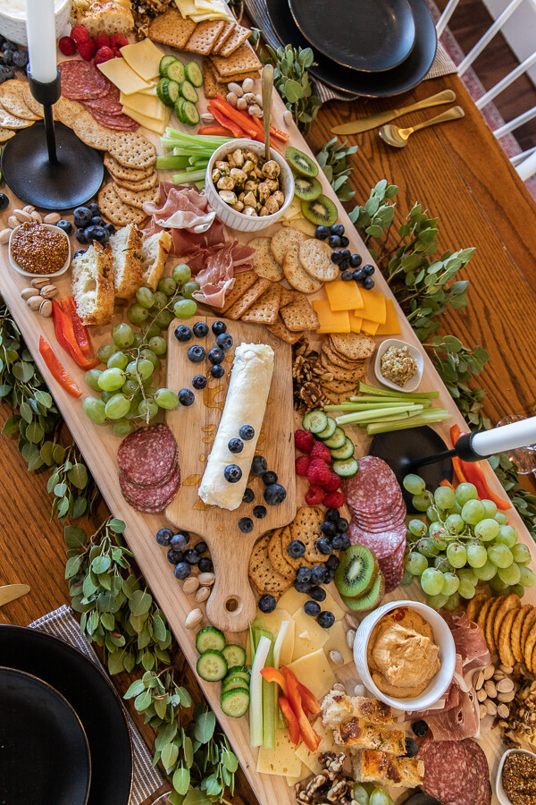 How to host a party in during the busy holiday season with ease! Let me share my tips, including how to create an amazing charcuterie board.