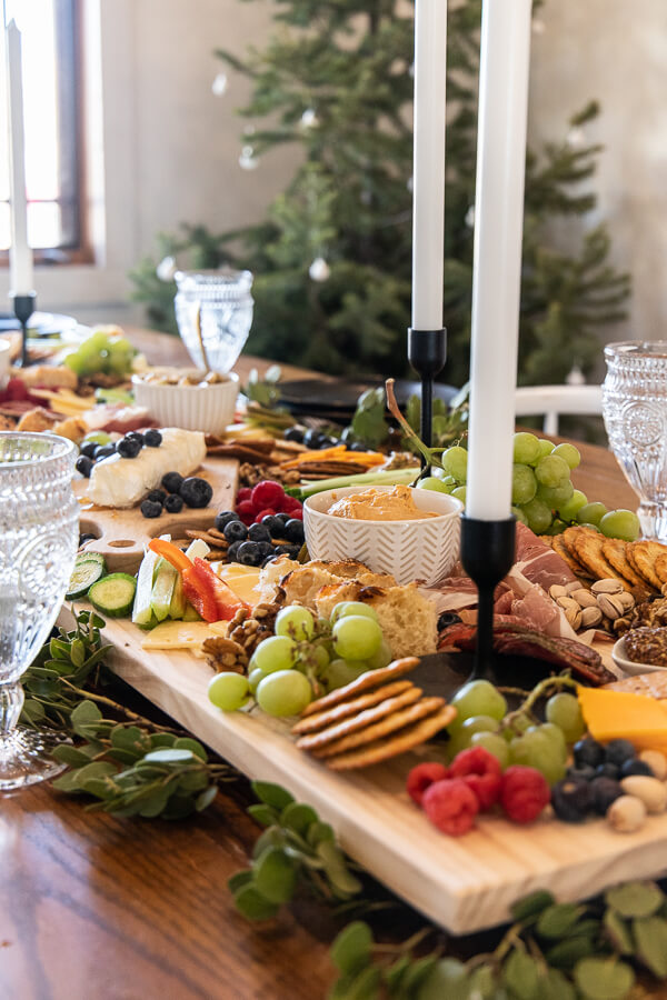How to host a party in during the busy holiday season with ease! Let me share my tips, including how to create an amazing charcuterie board.