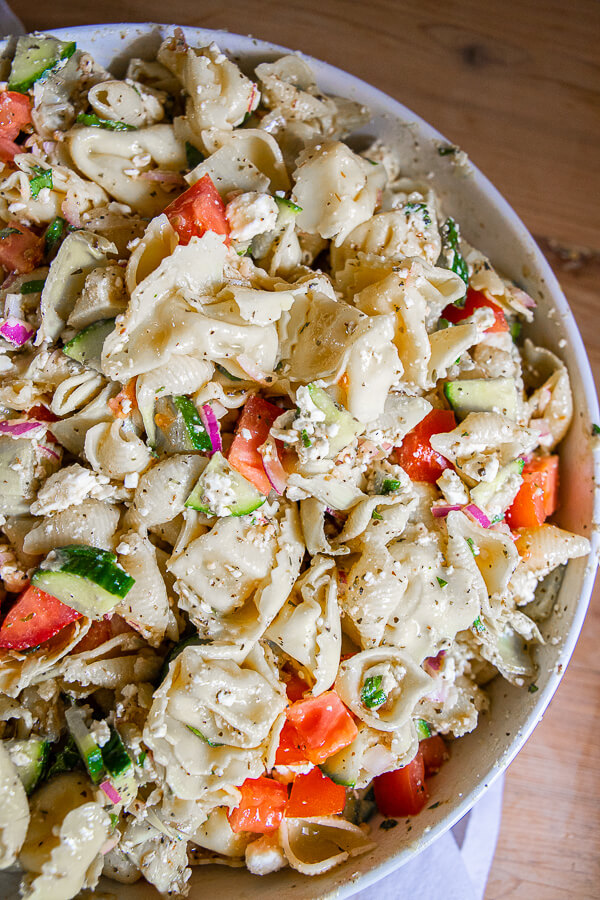 I love this tortellini pasta salad. The fresh ingredients combined with the creamy pasta makes for a killer as well as easy side dish. The dressing is one that I love to use on regular salads as well. This is a cold pasta salad, full of delicious flavor. It is a great side dish for hamburgers, grilled chicken and more. Its one of the best things I make! The whole family loves it. Make it today!