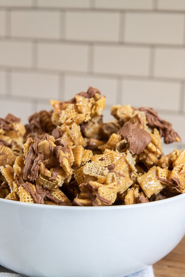 This ooey gooey Scotcharoos chex mix is the perfect treat! With peanut butter, chex cereal, chocolate and butterscotch its the perfect treat.