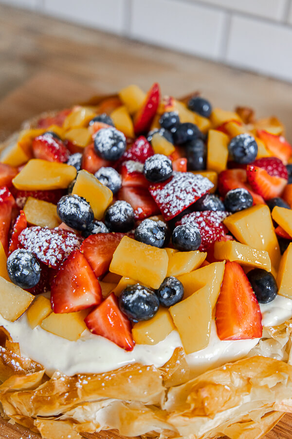 Make this easy simple summer fruit crostata with lemon cream cheese filling! This is refreshing, flavorful and so easy to make. I love a good fruit dessert, and this one takes the cake! You can change the fruit up depending on what is in season!