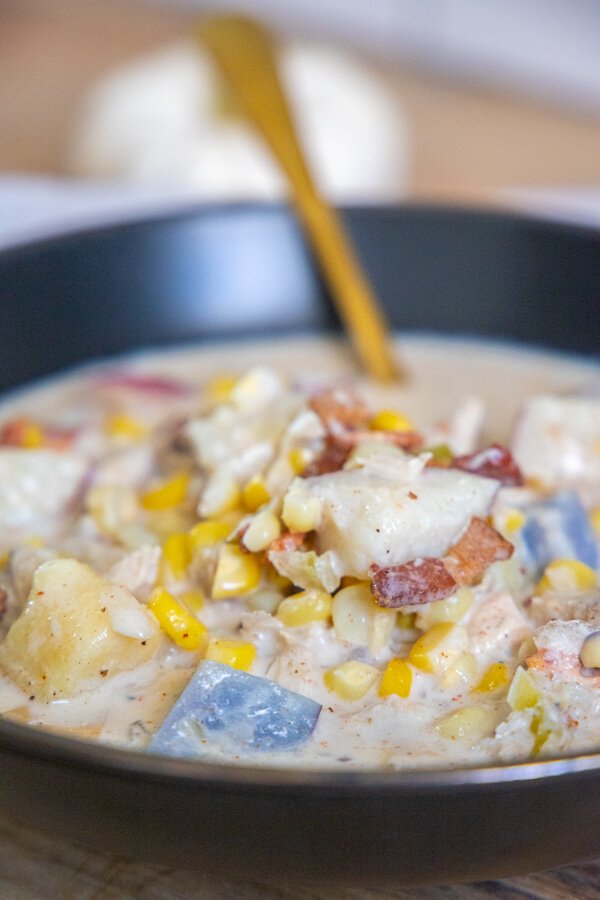 Make this hearty chicken corn chowder, full of corn, potatoes, bacon, herbs and more. This is full of flavor and affordable to make!