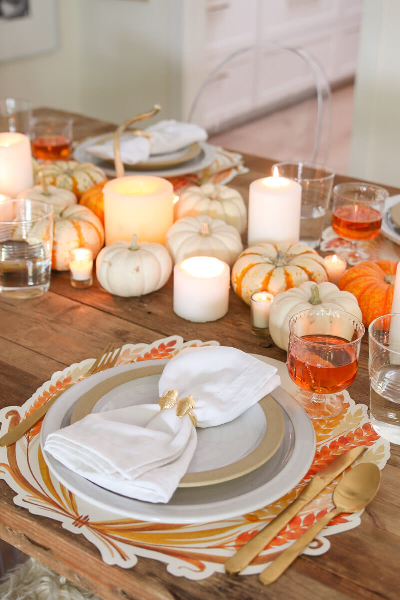 Over 40 gorgeous Thanksgiving tablescape ideas perfect for any home. Be inspired by fall foliage, pumpkins, place cards and more!