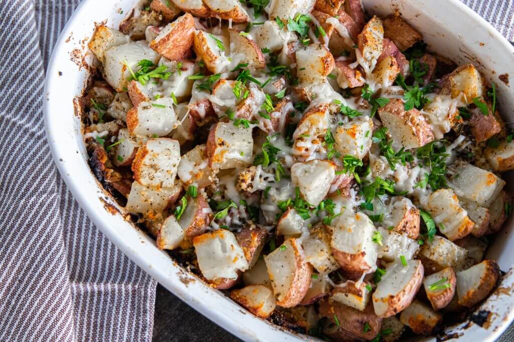 Amazing parmesan herb roasted potatoes perfect for any weeknight meal.