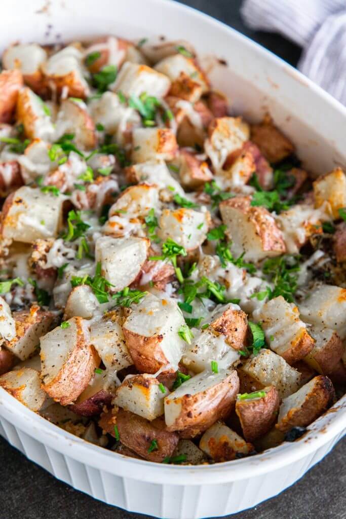 Make these amazing herb parmesan roasted potatoes for your next weeknight meal or even make them as a side dish for Thanksgiving! 
