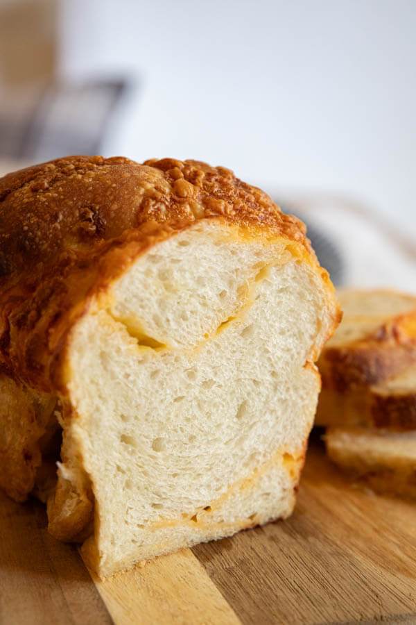 Make this amazing sourdough cheese bread. Its easy to make and the combination of the bread with the salty sharp cheese is perfection! This bread does not need much work, and the reward of a soft bread with cheesy goodness makes this such a good bread.