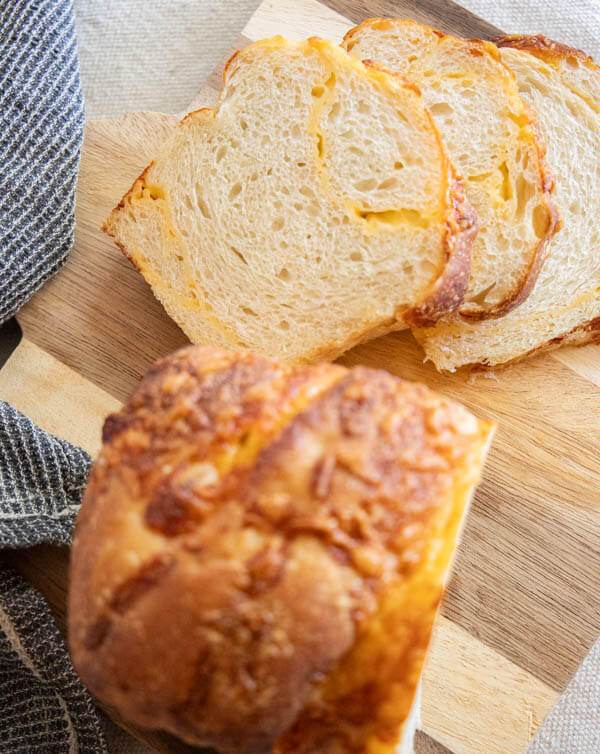 Make this amazing sourdough cheese bread. Its easy to make and the combination of the bread with the salty sharp cheese is perfection! This bread does not need much work, and the reward of a soft bread with cheesy goodness makes this such a good bread.