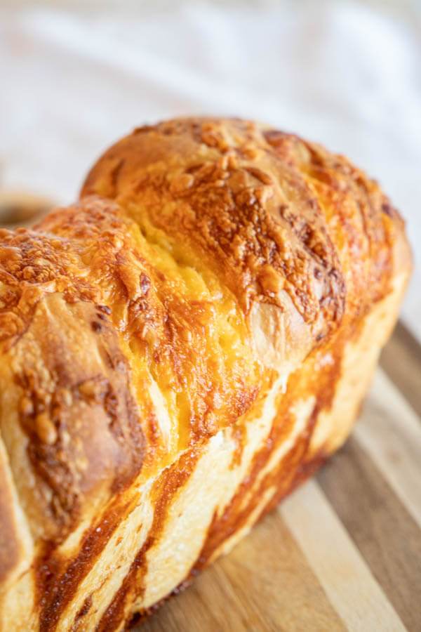 Make this amazing sourdough cheese bread. Its easy to make and the combination of the bread with the salty sharp cheese is perfection! This bread does not need much work, and the reward of a soft bread with cheesy goodness makes this such a good bread.