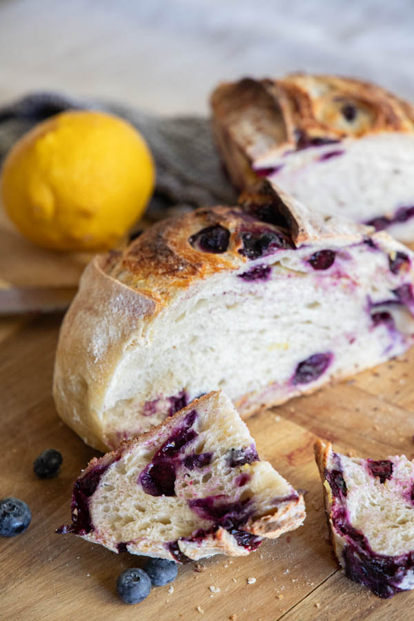 Make this amazing easy lemon blueberry sourdough bread! Its an easy step by step recipe sharing how to add the inclusions easily. The loaf tastes sweet, lemony with that subtle blueberry flavor!